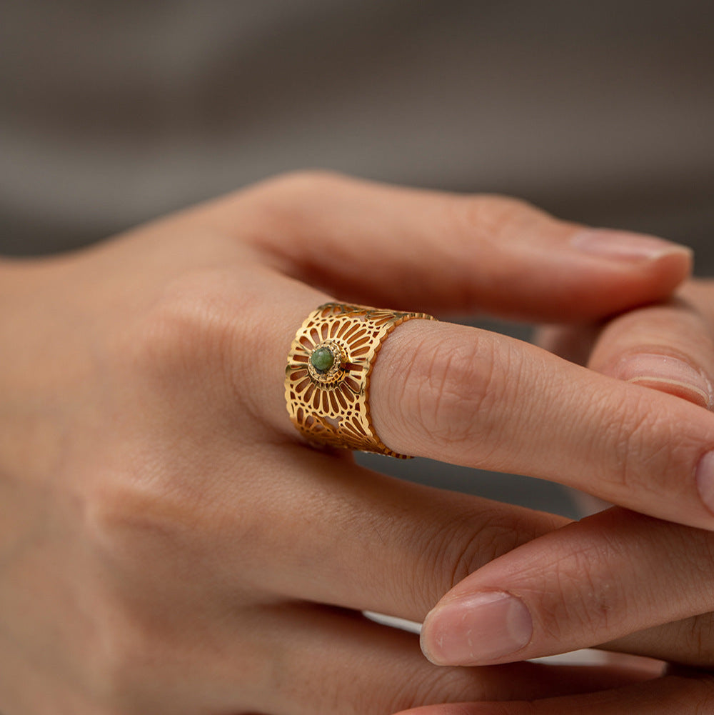 Adjustable hypoallergenic ring with green stone, showcasing delicate and lightweight design-2