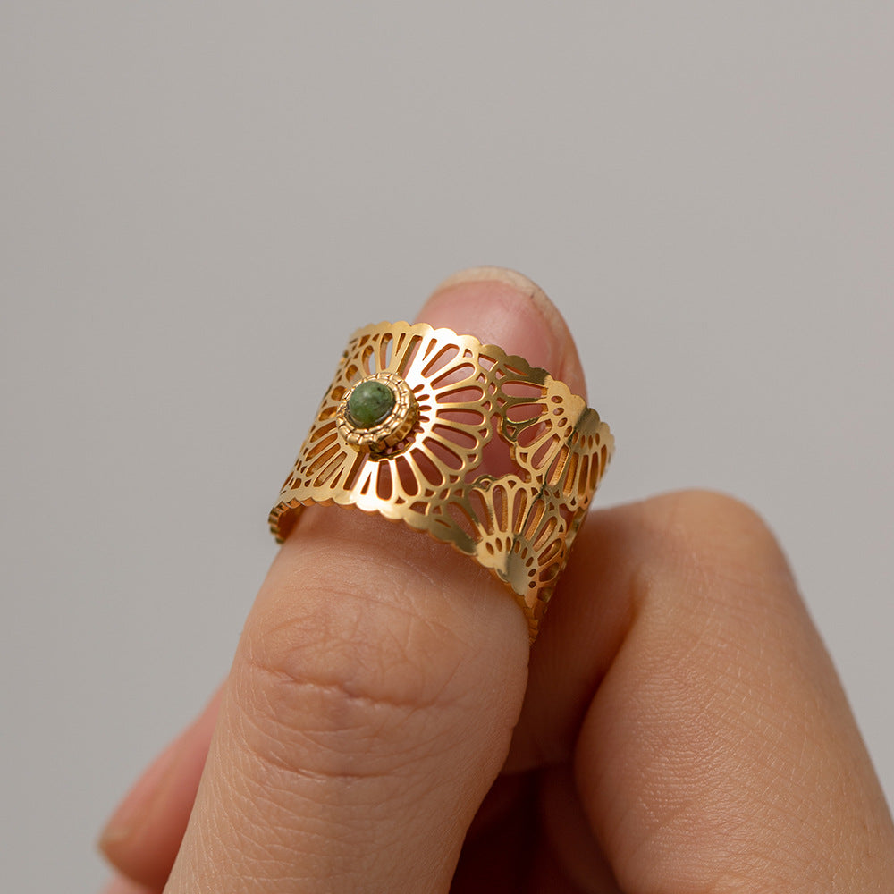 Adjustable hypoallergenic ring with green stone, showcasing delicate and lightweight design-11