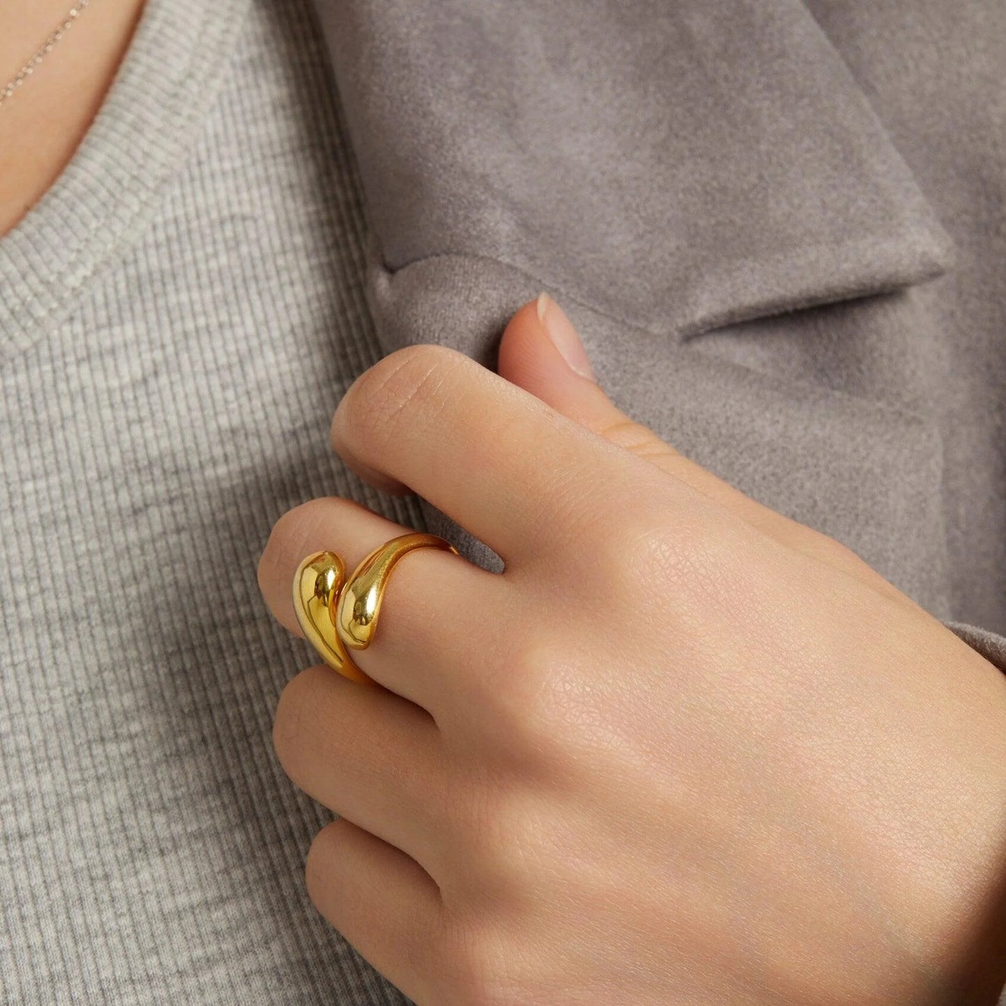 Adjustable teardrop-shaped gold and silver ring with 8mm waterdrop design by Arza Accessories, perfect for everyday or party wear 4
