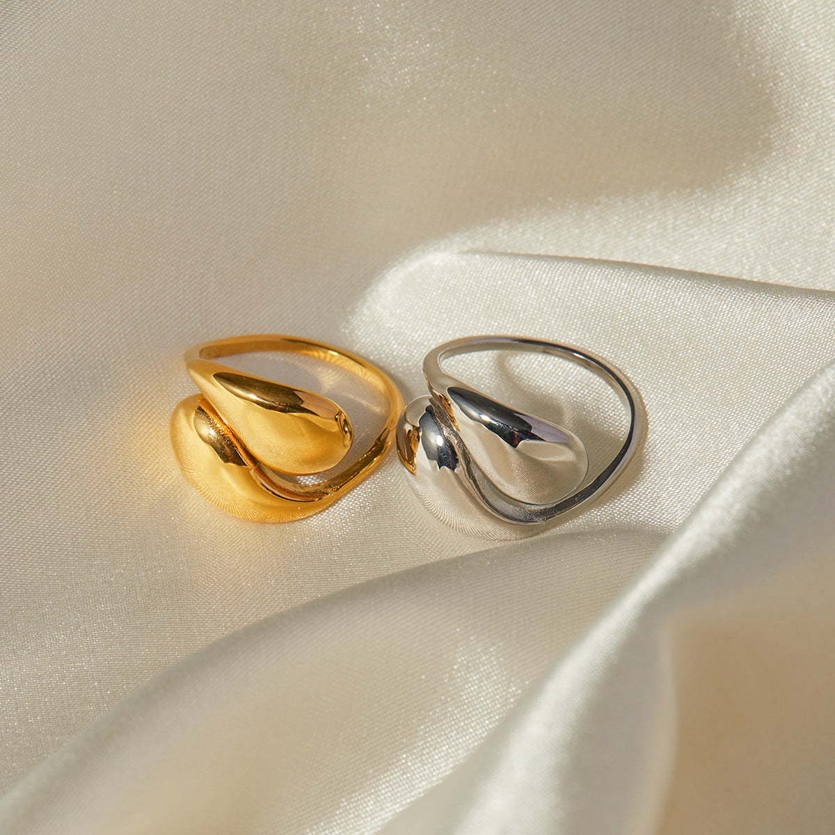 Adjustable teardrop-shaped gold and silver ring with 8mm waterdrop design by Arza Accessories, perfect for everyday or party wear 5