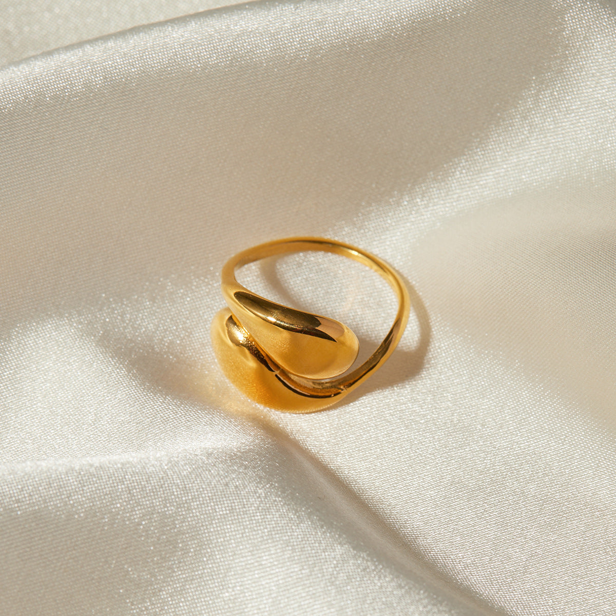 Adjustable teardrop-shaped gold and silver ring with 8mm waterdrop design by Arza Accessories, perfect for everyday or party wear 6