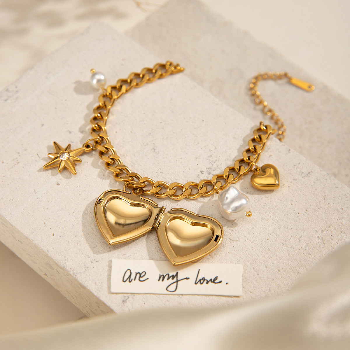Bohemian-style gold heart charm bracelet by Azra Accessories with adjustable 17.5+5cm length - perfect for everyday boho looks 2