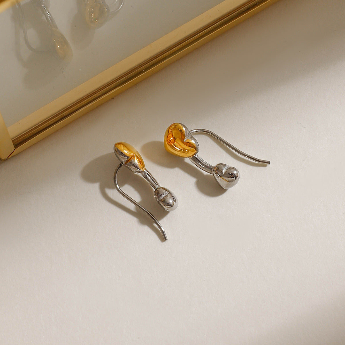 Gold and silver two-tone heart earrings for women, hypoallergenic 0.75cm design for sensitive ears 2