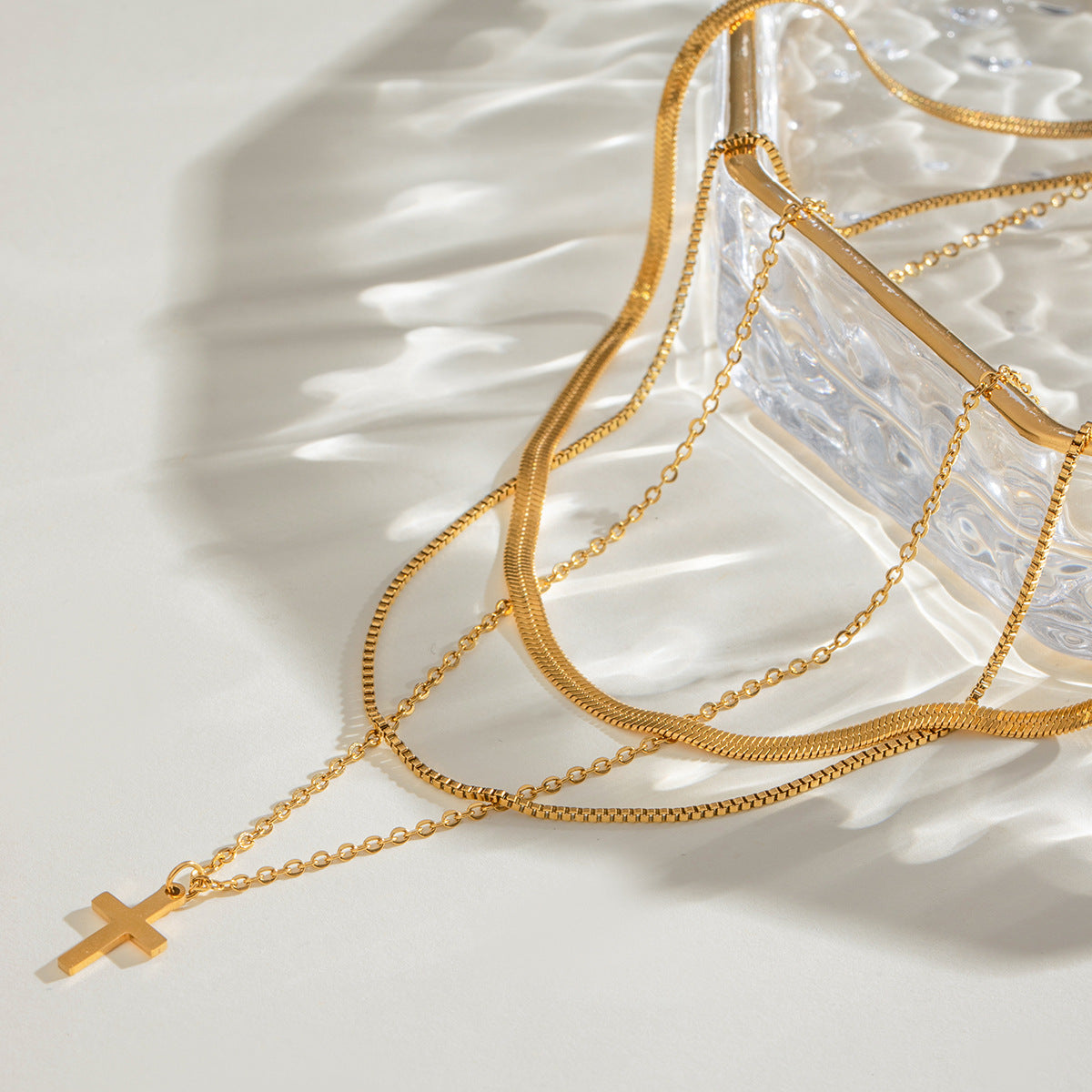 Gold cross pendant necklace shown at three adjustable lengths (15.7-17.7in) with 11.8g stainless steel chain 5