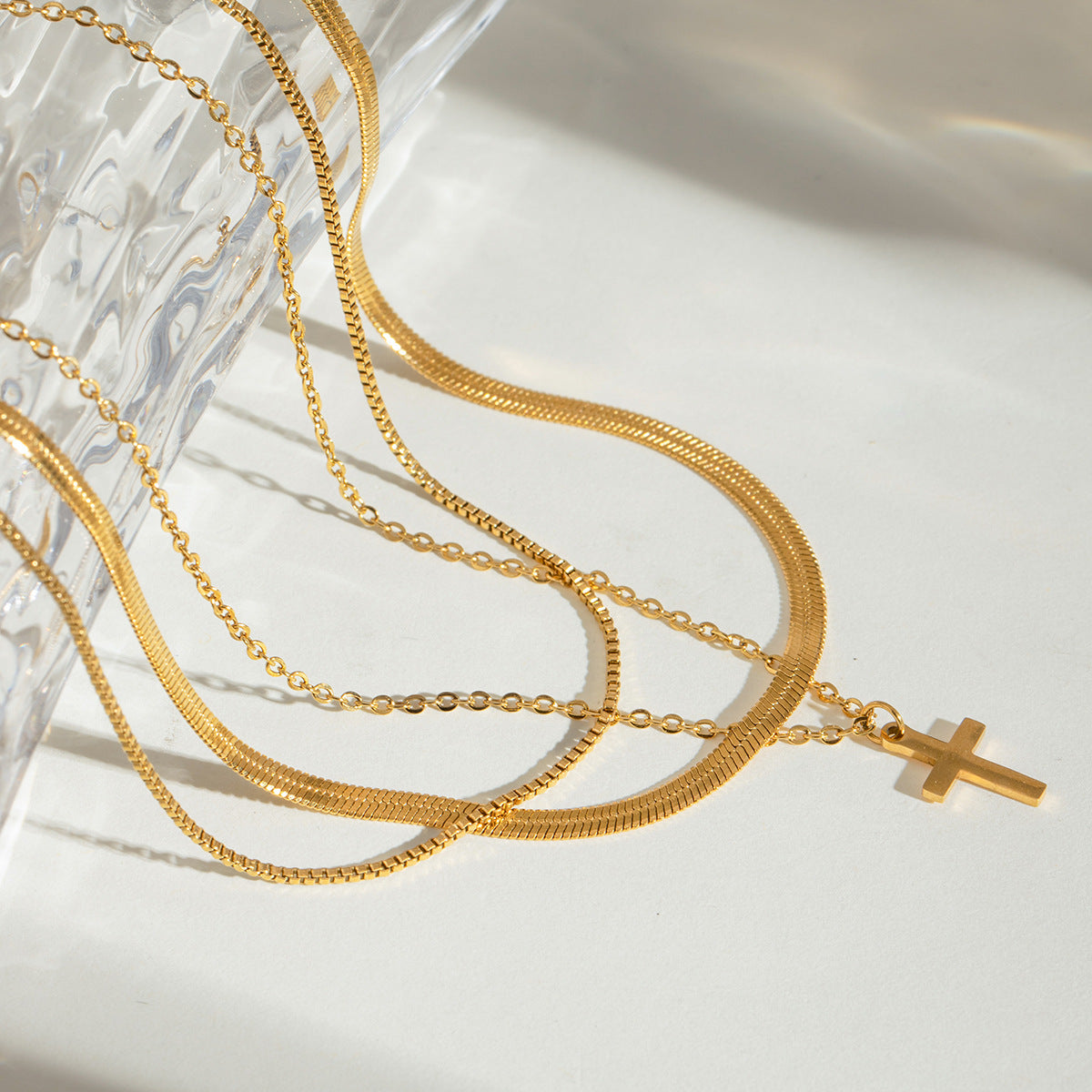 Gold cross pendant necklace shown at three adjustable lengths (15.7-17.7in) with 11.8g stainless steel chain 6