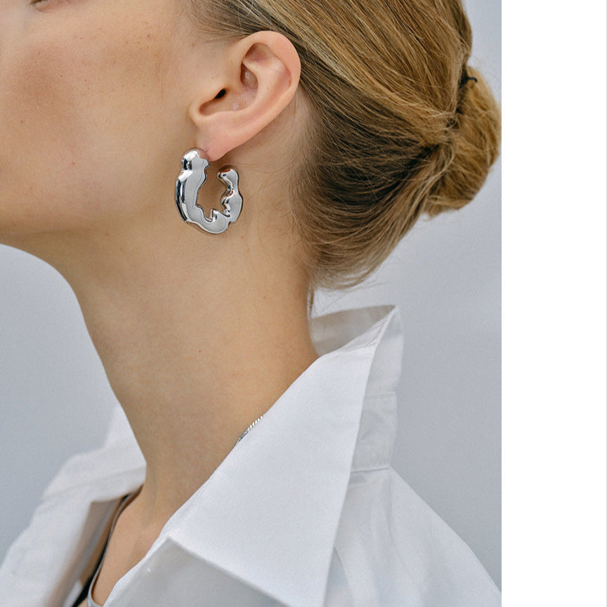 Trendy 3.8cm gold and silver two-tone hoop earrings by Arza Accessories - waterproof stainless steel everyday and party jewelry