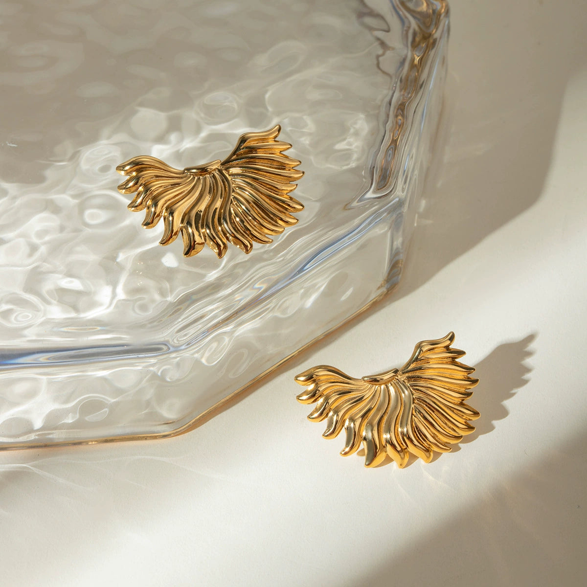 Gold half-sun stud earrings for women, hypoallergenic stainless steel, lightweight casual and party wear. 6