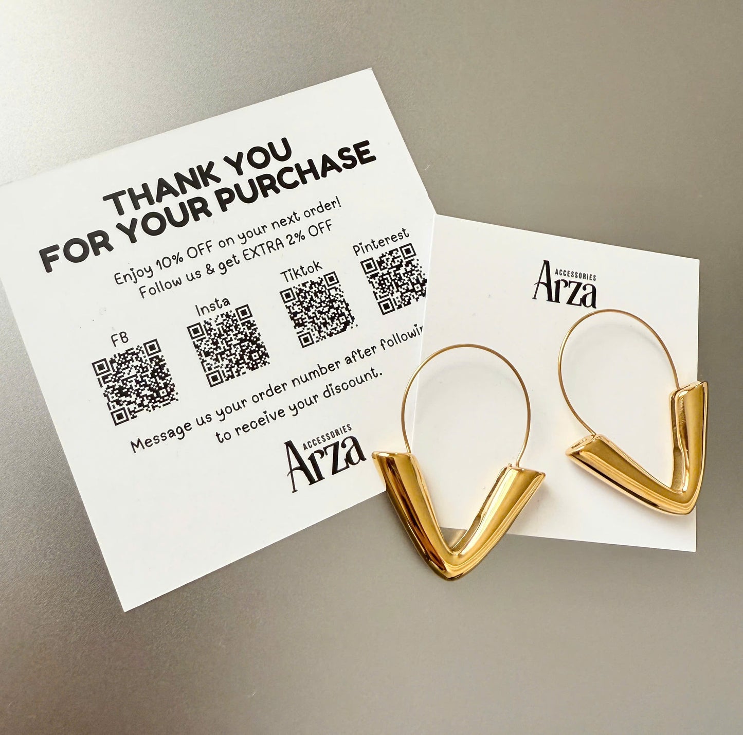 Gold-tone stainless steel arrow hoop earrings, 4.3cm diameter, modern statement jewelry 17