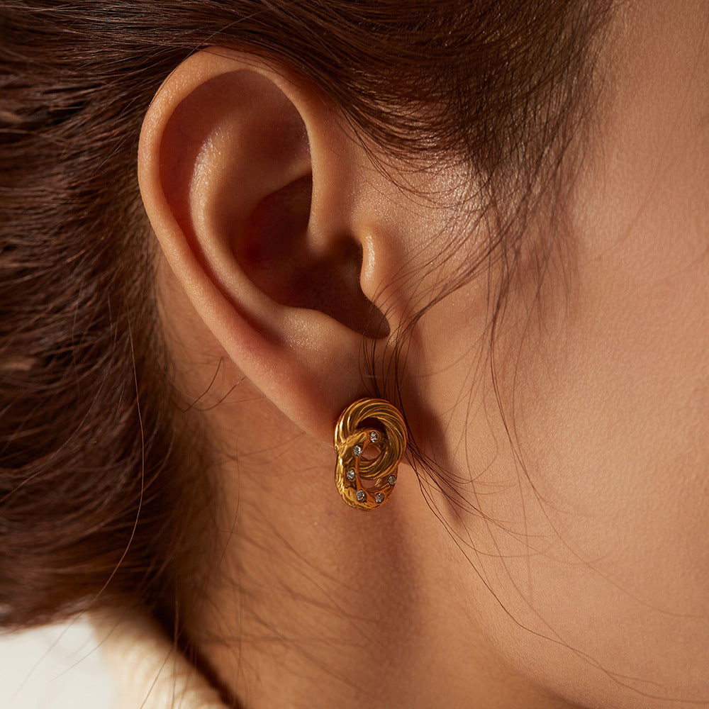 Delicate gold-tone slim hoop earrings (1.1mm) for women, made of lightweight stainless steel. 5