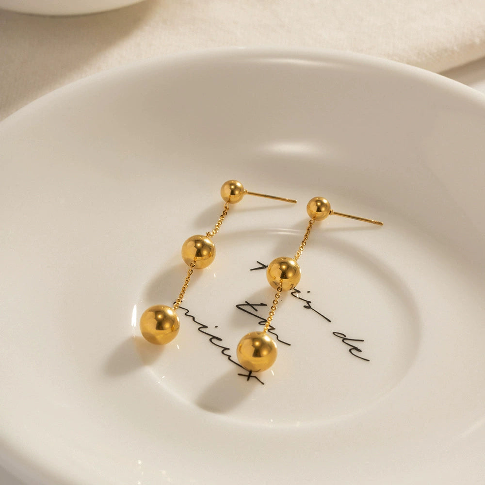Gold ball dangle earrings for women (5cm length) - trendy casual jewelry with modern design 2