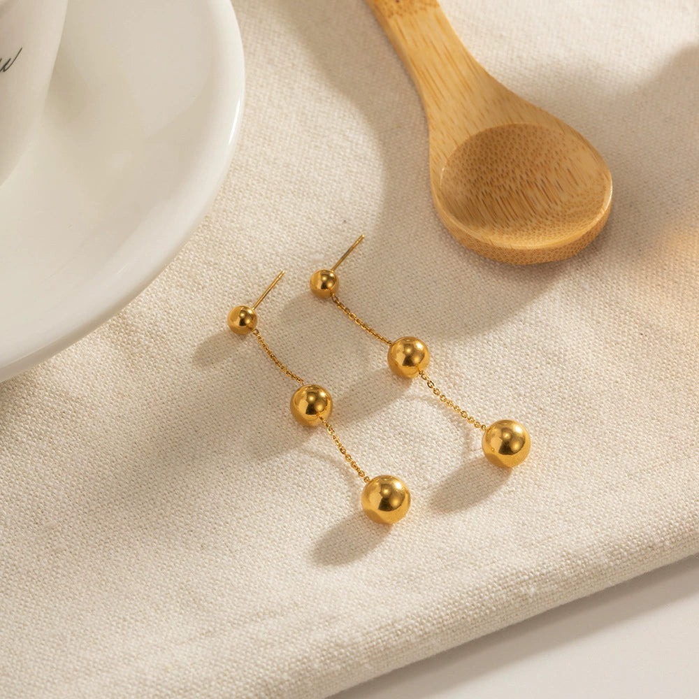 Gold ball dangle earrings for women (5cm length) - trendy casual jewelry with modern design 4