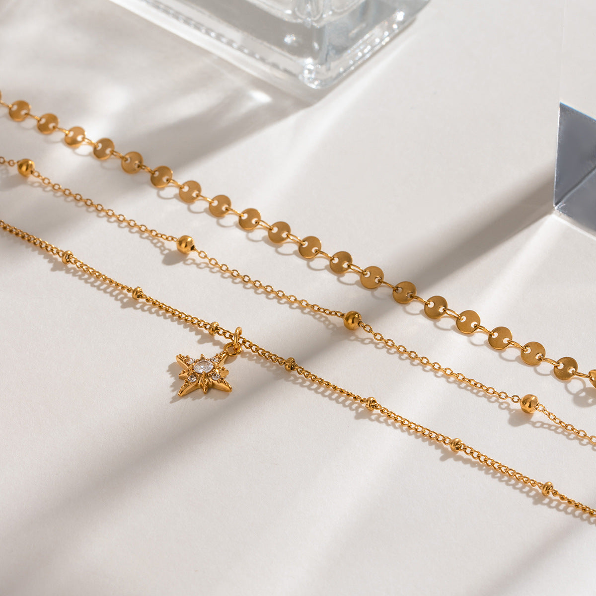 Three gold layered necklaces (40+5cm, 41.5+5cm, 43+5cm) with 1.43cm coin charm, shown in boho styling 3