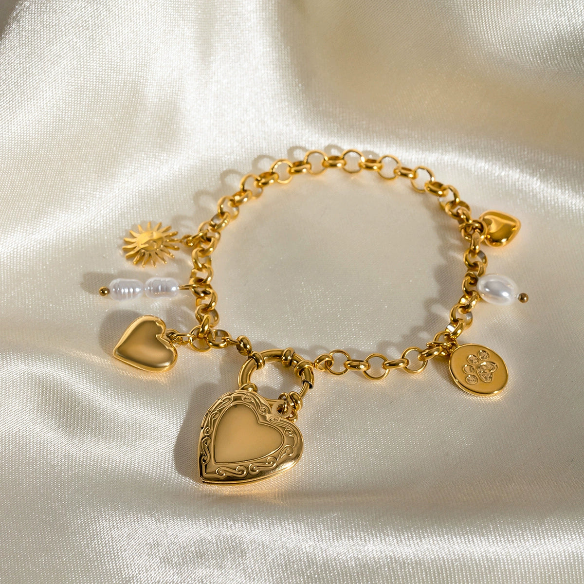 Gold adjustable heart charm bracelet by Azra Accessories – perfect for everyday wear and gifting. 2