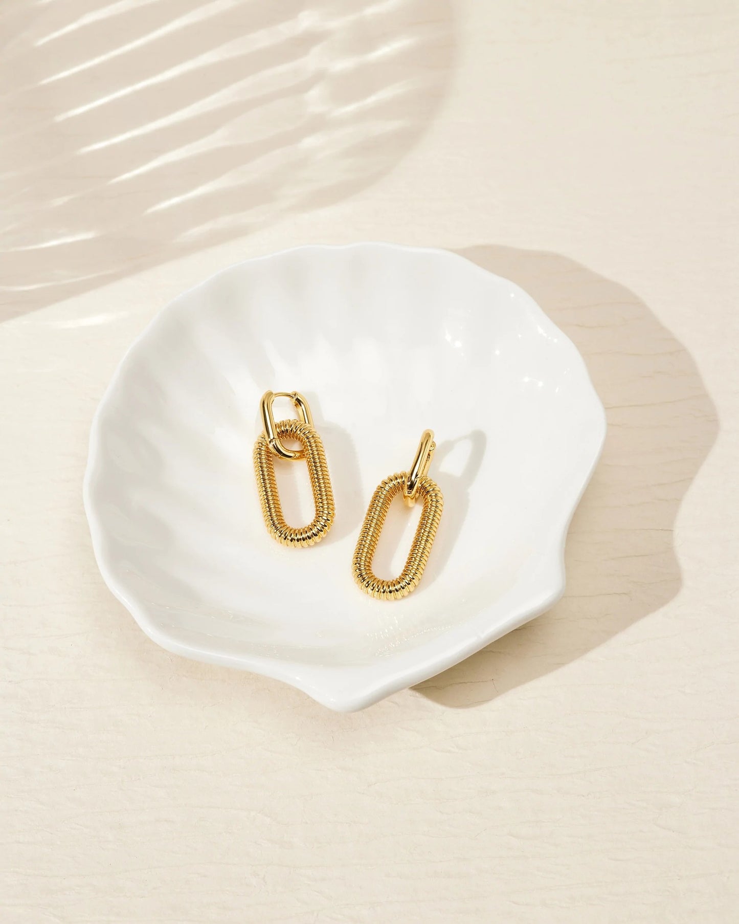 Trendy gold dangle earrings (3cm) for women - perfect for parties and casual wear 9