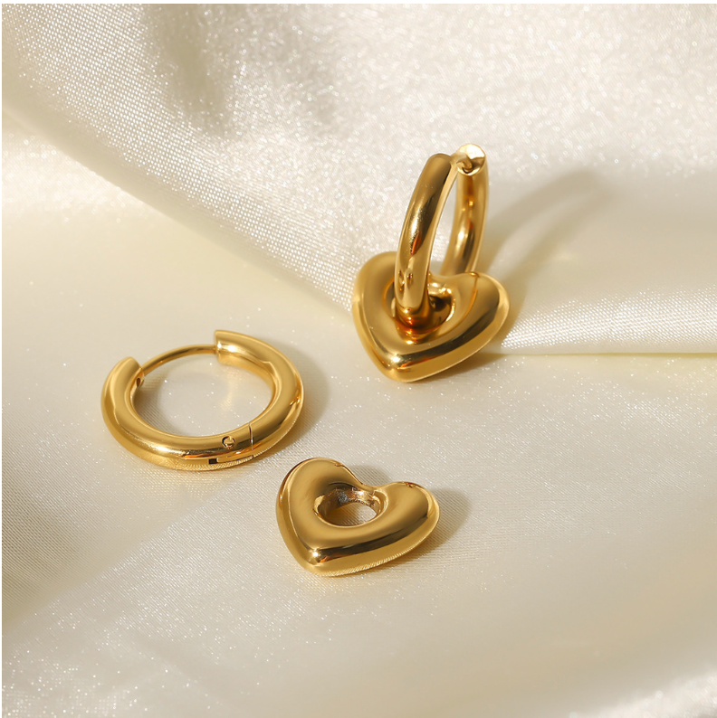 Gold heart-shaped earrings for women (2.2cm x 1.5cm), simple elegant design for daily wear or special occasions. 1