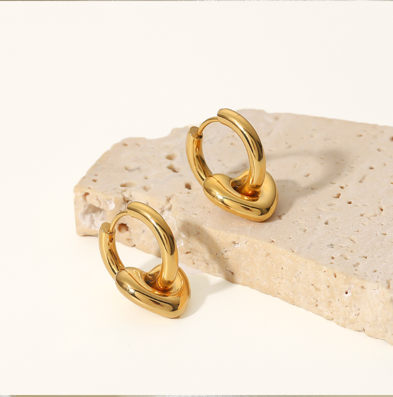 Gold heart-shaped earrings for women (2.2cm x 1.5cm), simple elegant design for daily wear or special occasions. 3