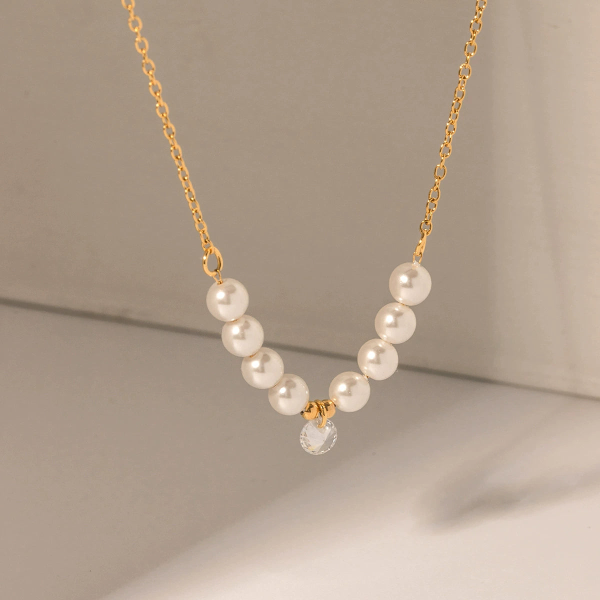 Minimalist gold necklace with pearl accent showing adjustable 40+5cm chain and delicate 2.15g design 3