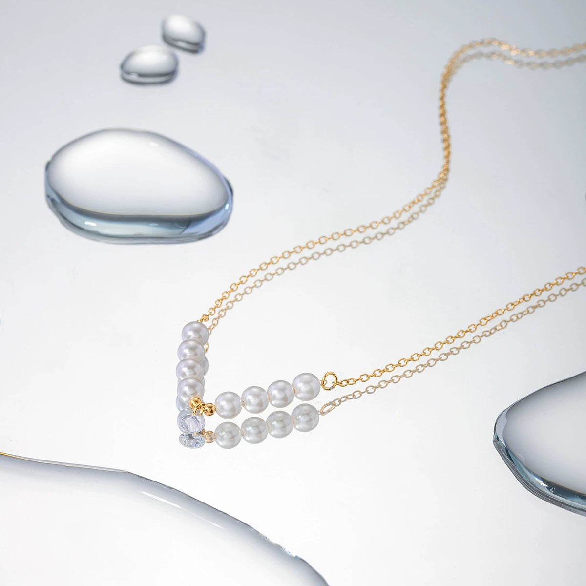 Minimalist gold necklace with pearl accent showing adjustable 40+5cm chain and delicate 2.15g design 2