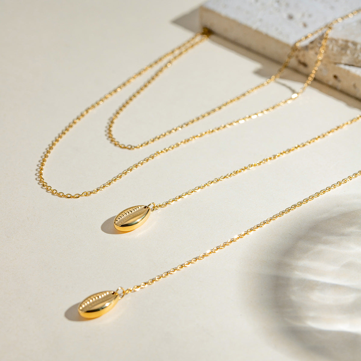 Thin gold adjustable chain necklace (110cm length, 0.8cm width) shown in layered styling 3