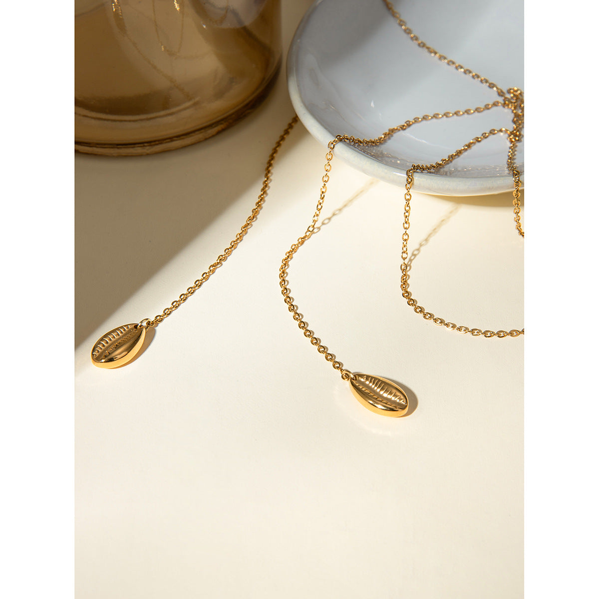 Thin gold adjustable chain necklace (110cm length, 0.8cm width) shown in layered styling 4