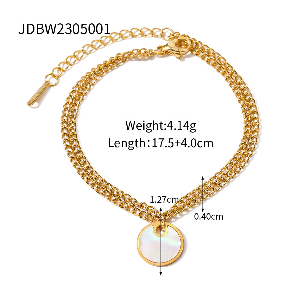 Delicate gold adjustable bracelet (17.5+4cm) with 1.27cm mother-of-pearl charm shown on wrist 5