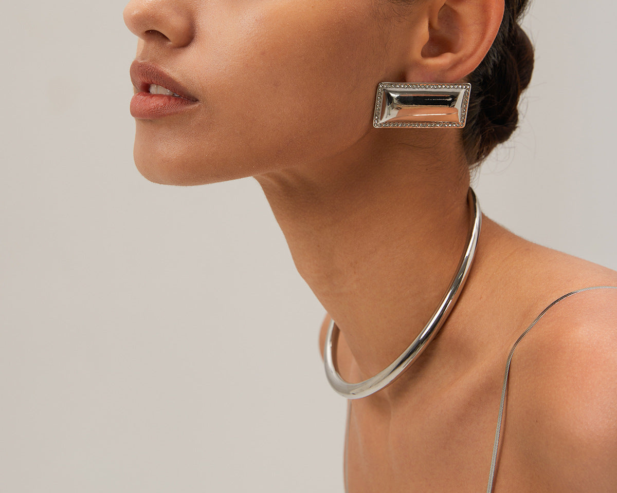 Close-up view of Arza's two-tone adjustable choker necklace showing gold and silver stainless steel links (11.4cm circumference) 10 
