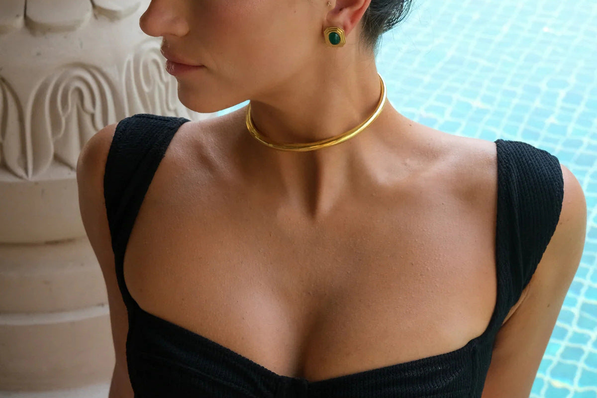 Close-up view of Arza's two-tone adjustable choker necklace showing gold and silver stainless steel links (11.4cm circumference) - 4