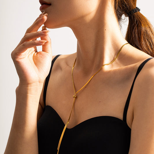 Thin adjustable gold chain necklace for women showing delicate 0.24cm width and 69cm length 1