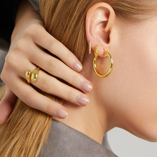 Adjustable teardrop-shaped gold and silver ring with 8mm waterdrop design by Arza Accessories, perfect for everyday or party wear 2
