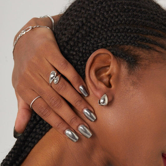 Adjustable teardrop-shaped gold and silver ring with 8mm waterdrop design by Arza Accessories, perfect for everyday or party wear 1