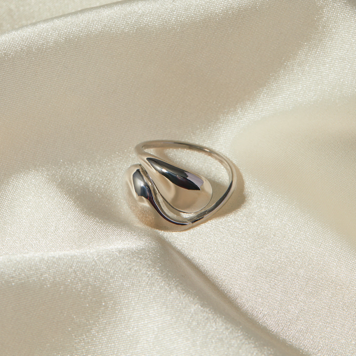Adjustable teardrop-shaped gold and silver ring with 8mm waterdrop design by Arza Accessories, perfect for everyday or party wear 9