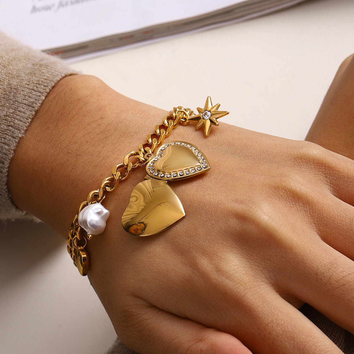 Bohemian-style gold heart charm bracelet by Azra Accessories with adjustable 17.5+5cm length - perfect for everyday boho looks 1
