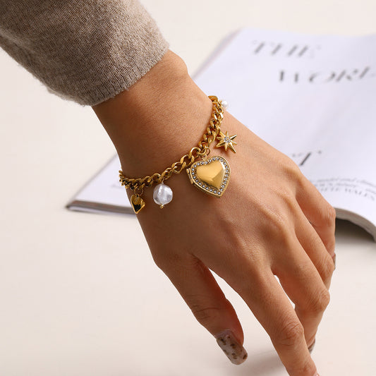 Bohemian-style gold heart charm bracelet by Azra Accessories with adjustable 17.5+5cm length - perfect for everyday boho looks 6