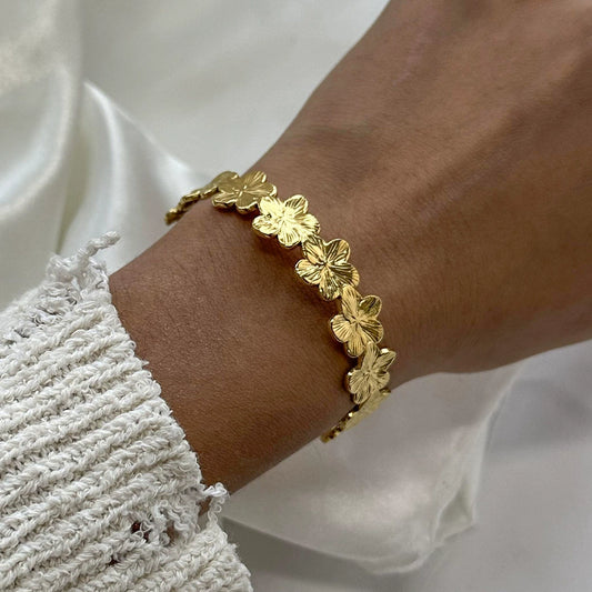 Gold adjustable bracelet with delicate floral design by Azra Accessories - 5.8cm diameter for everyday wear 1