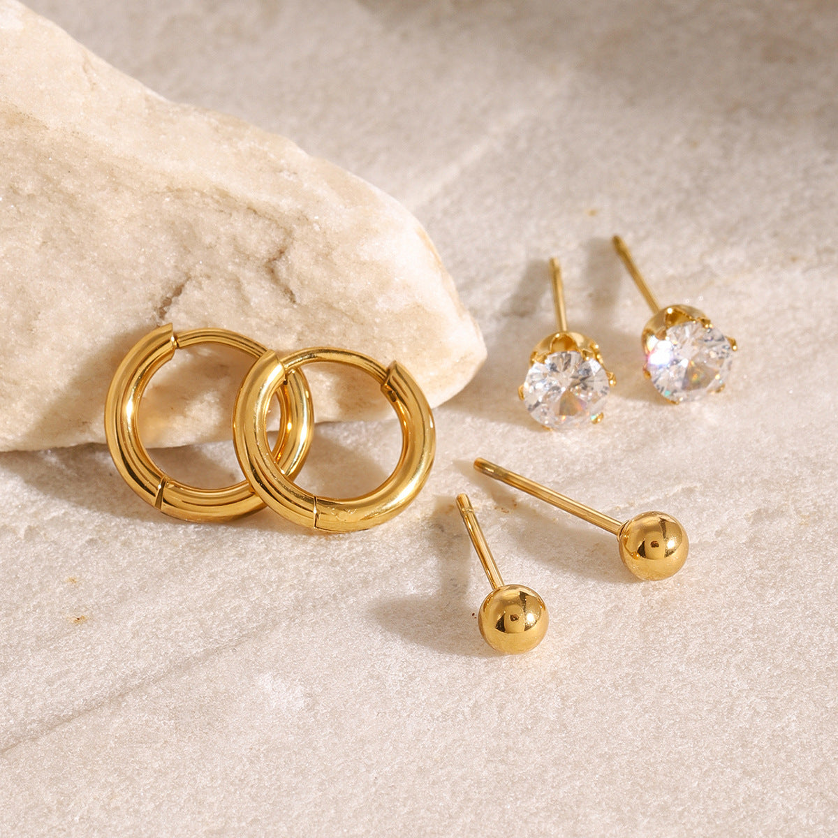 Minimalist gold hoop earrings (1.3cm) for women - lightweight everyday stainless steel jewelry by Arza Accessories 1