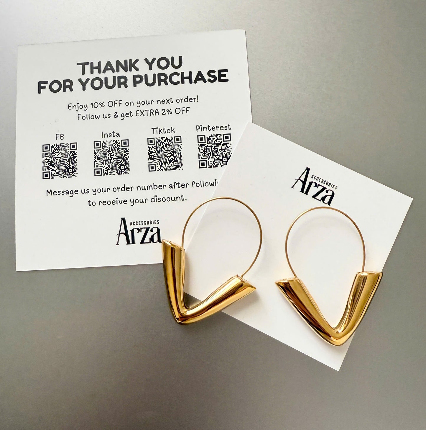 Gold-tone stainless steel arrow hoop earrings, 4.3cm diameter, modern statement jewelry 18