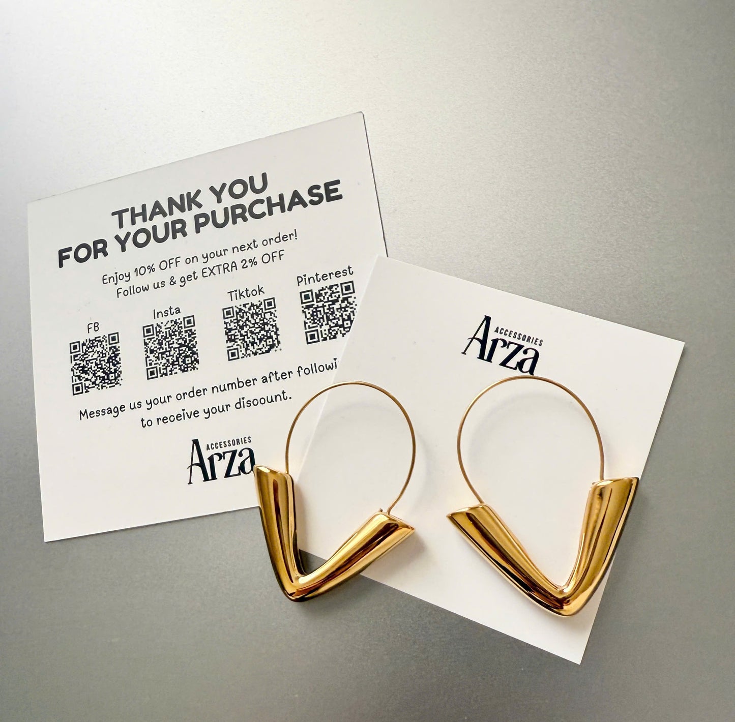 Gold-tone stainless steel arrow hoop earrings, 4.3cm diameter, modern statement jewelry 19