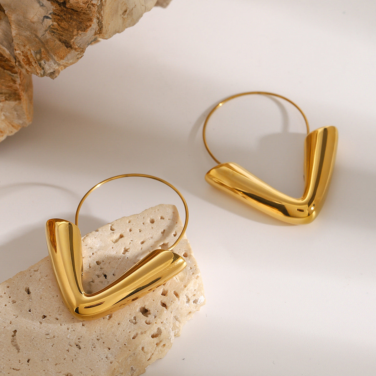 Gold-tone stainless steel arrow hoop earrings, 4.3cm diameter, modern statement jewelry 3