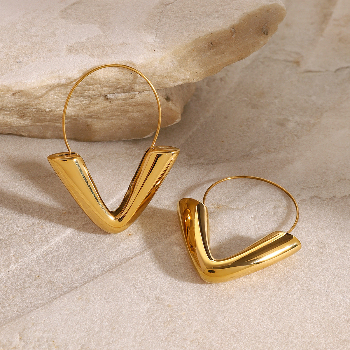 Gold-tone stainless steel arrow hoop earrings, 4.3cm diameter, modern statement jewelry 5