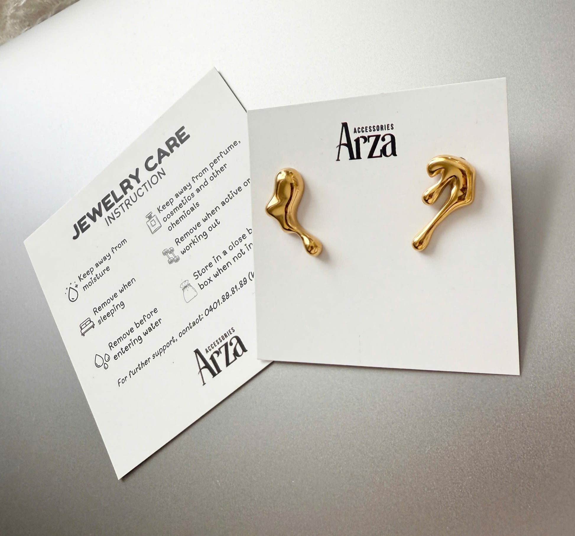 Gold-tone stainless steel asymmetrical huggie earrings, 3.43cm with 2.04cm drop, modern everyday jewelry 12