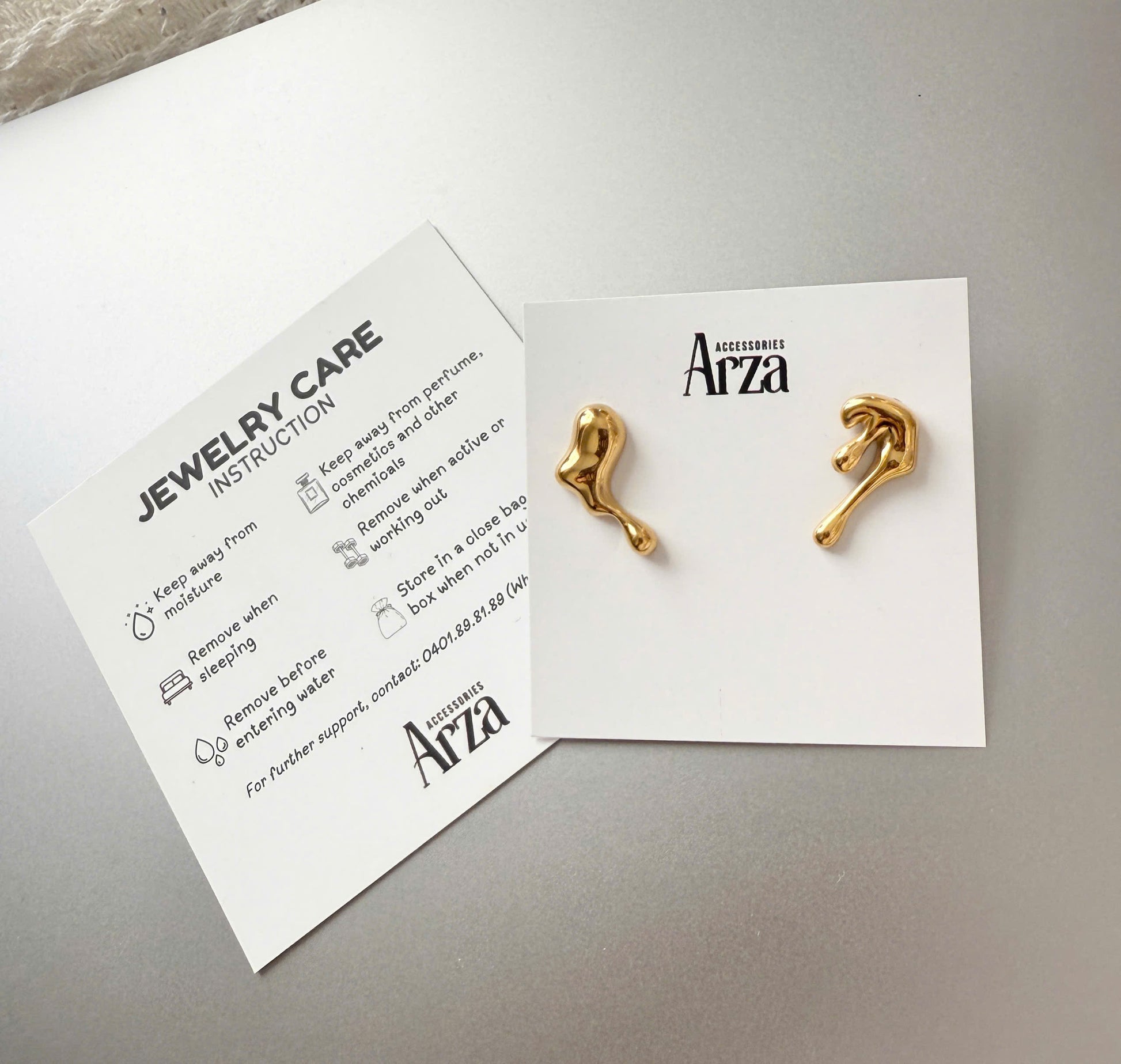 Gold-tone stainless steel asymmetrical huggie earrings, 3.43cm with 2.04cm drop, modern everyday jewelry 17