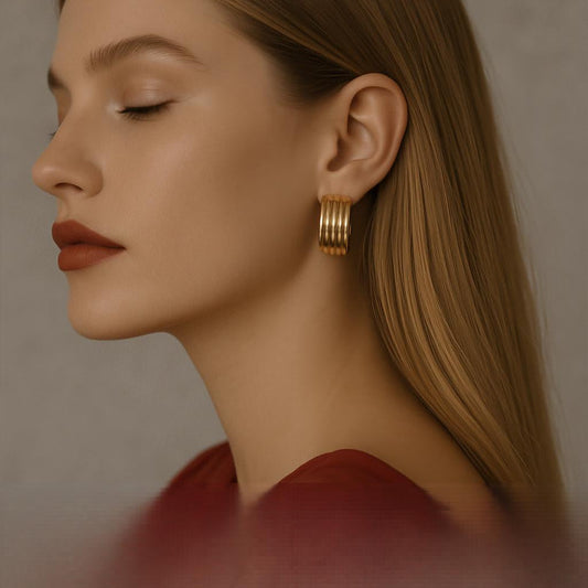 Gold-tone stainless steel geometric statement earrings, 2.76cm, lightweight and hypoallergenic. 69
