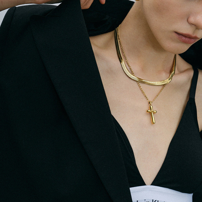 Gold-tone cross pendant necklace with 50cm chain, stainless steel, waterproof, and hypoallergenic design for women. 1