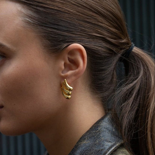 Trendy gold-tone glamorous hoop earrings (2.75cm) in stainless steel by Arza Accessories - perfect party statement jewelry for special occasions