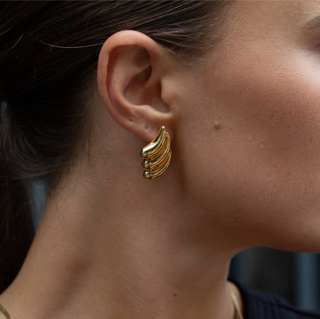Trendy gold-tone glamorous hoop earrings (2.75cm) in stainless steel by Arza Accessories - perfect party statement jewelry for special occasions 2