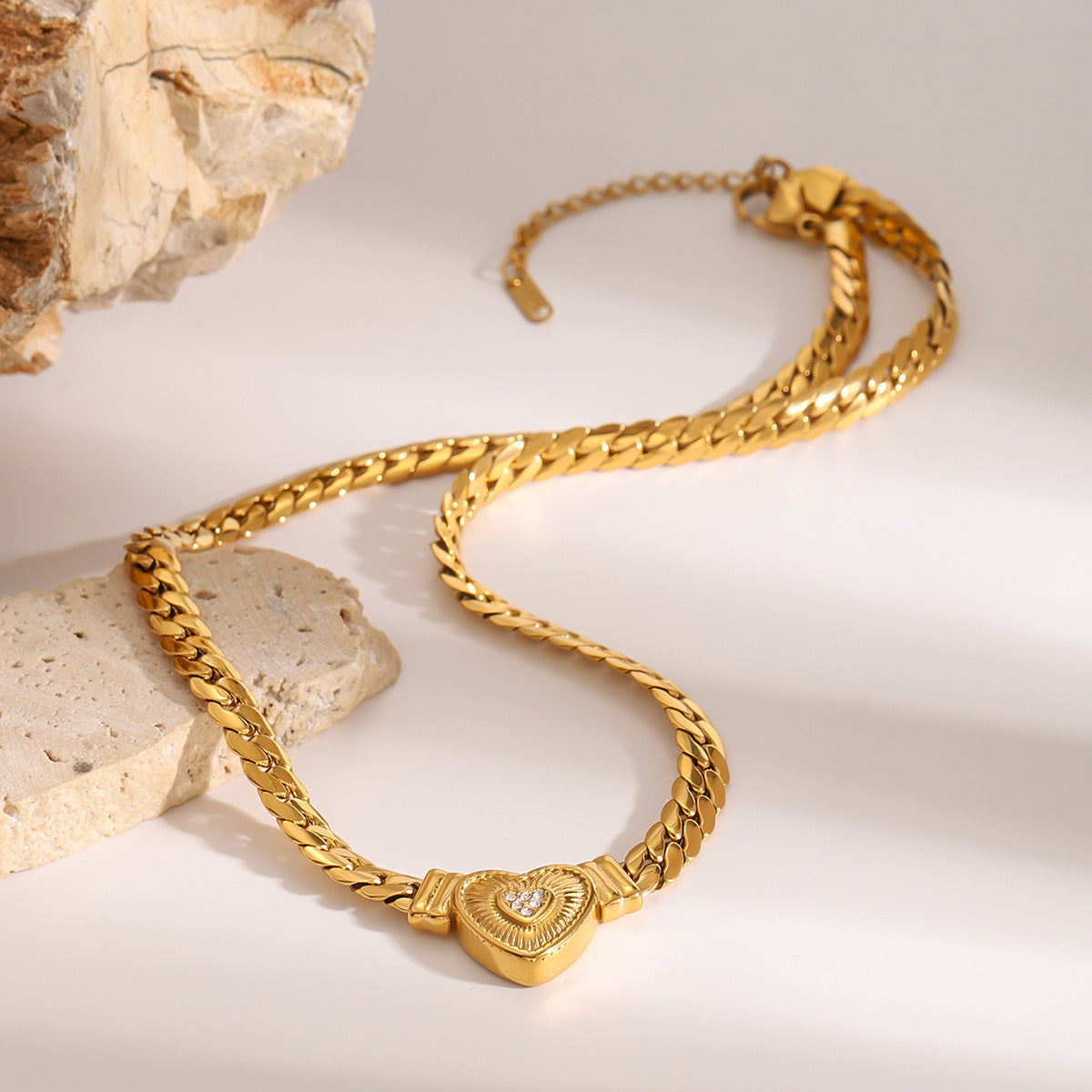 Gold-tone stainless steel heart pendant choker necklace with adjustable chain for women. 2
