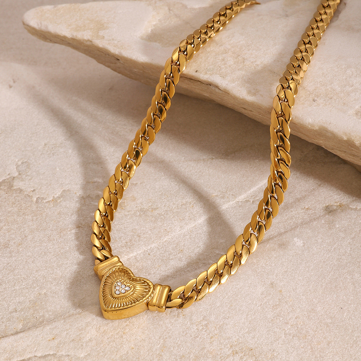 Gold-tone stainless steel heart pendant choker necklace with adjustable chain for women. 3