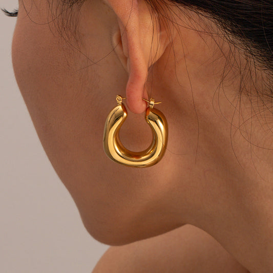 Gold-tone asymmetrical hoop earrings for women (3.02cm, 17.29g) - trendy stainless steel statement jewelry by Arza Accessories Australia - 1