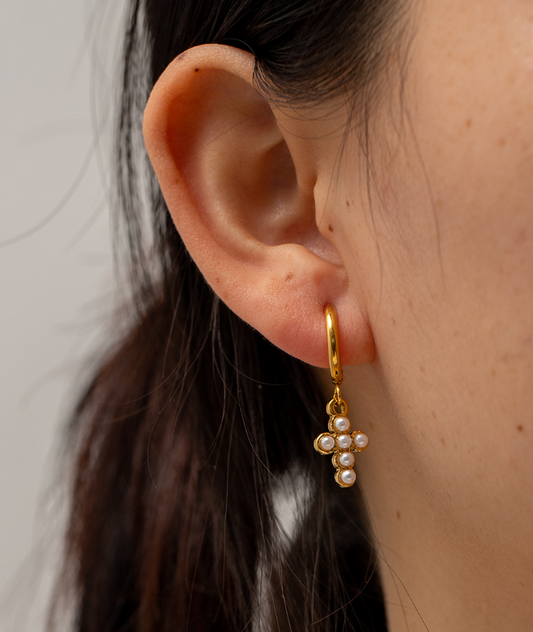 Hypoallergenic gold cross earrings with pearl studs for women, simple and elegant design for everyday or party wear. -1