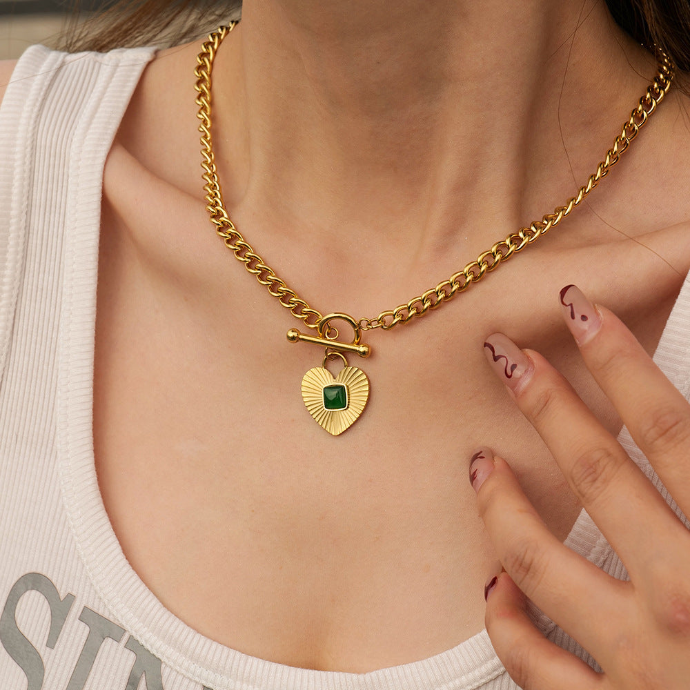 Gold heart pendant necklace with blue stone for women, bold statement jewelry for special occasions 1